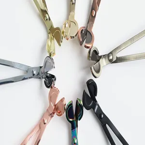 Macro view of multi-color stainless steel candle wick trimmers in a circular layout