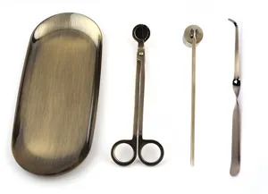 4-piece antique brass candle care set with wick trimmer, snuffer, dipper, and tray