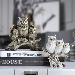 Vintage resin owl family statues on decorative books for elegant home and office decor