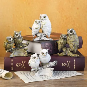 Detailed vintage pair of owl resin figurines for creative home and office desktop decoration