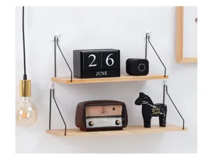 Two-tier wooden wall mounted shelf with black metal brackets and decorative objects