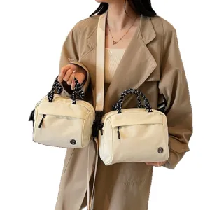 Elegant cream white minimalist square crossbody handbag with stylish woven handles for women