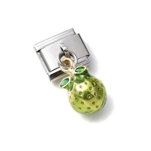 Detail macro view of green enamel fruit charm with stainless steel link