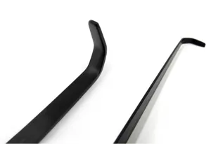 Close-up detail of the curved tip on a matte black stainless steel candle wick dipper.