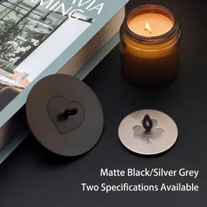 Matte black and silver stainless steel candle lids in two sizes