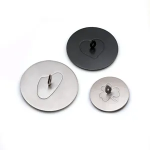 Set of stainless steel candle toppers with decorative engraved patterns for scented candles