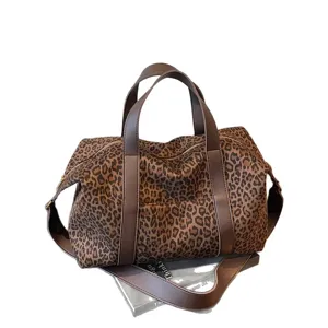 Borsa da viaggio grande con stampa leopardata vintage e tracolla in pelle marrone