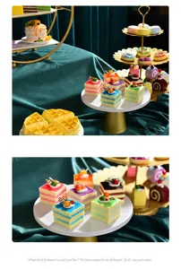 High-detail close-up of realistic faux dessert cakes on elegant gold and white stands