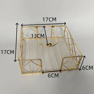 Gold metal napkin holder detail view showing dimensions and metal wire design structure.