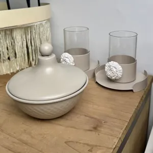 Detailed view of Middle Eastern iron candy bowl and cup holders with 3D flower accents.