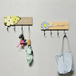 French country solid wood wall hook with creative flower decor and black metal hooks for entry.