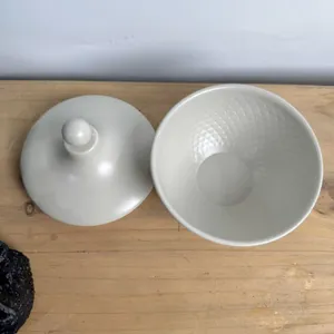 Detailed top view of a white Middle Eastern style candy bowl with lid and textured interior