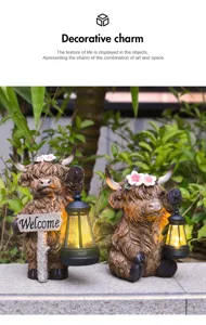 Detailed view of solar-powered highland cow garden statues with glowing lanterns