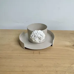 Detail of Middle Eastern iron candy bowl set with elegant 3D white flower decoration