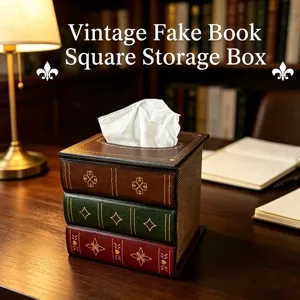 Vue détaillée d'une boîte à mouchoirs vintage imitant une pile de trois livres classiques