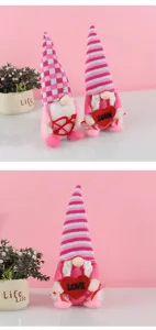Detail eines rosa Valentinstag-Gnom-Plüschtiers mit einem roten Glitzerherz und LOVE.