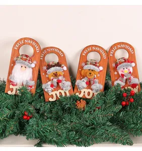 Detailed view of four wooden Christmas door hangers with Santa, snowman and reindeer.