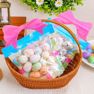 Colorful speckled Easter foam eggs in bow-decorated gift bags for festive party decor