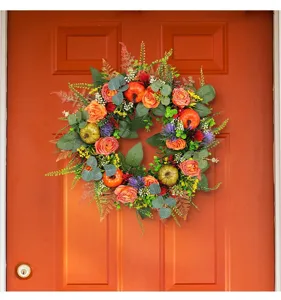 Artificial autumn pumpkin and rose wreath for Thanksgiving festive front door decoration