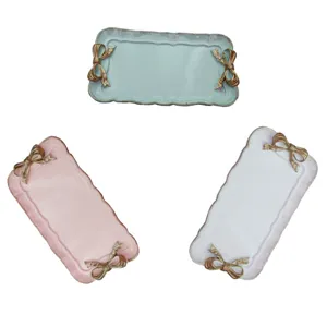 Bandeja decorativa de resina vintage francesa con lazos dorados para guardar joyas