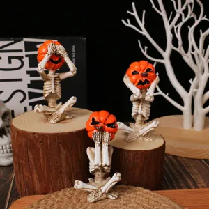 Set of three meditation yoga pumpkin head skeleton figurines for Halloween decor