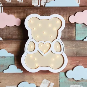 Adorable wooden bear shaped night light with warm LED glowing hearts for nursery room decoration