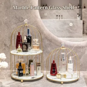 Goldenes Make-up-Regal im Vogelkäfig-Stil mit eleganten Trennwänden aus Marmorglas