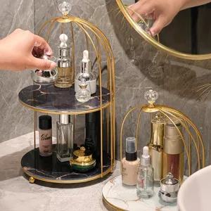 Eleganter goldener Vogelkäfig Kosmetikständer mit Marmortabletts für Bad