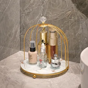 Luxuriöser goldener Vogelkäfig-Make-up-Organizer mit Marmorsockel für das Badezimmer-Waschbecken