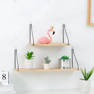 Minimalist wooden wall-mounted storage shelves with black metal wire frames for decor