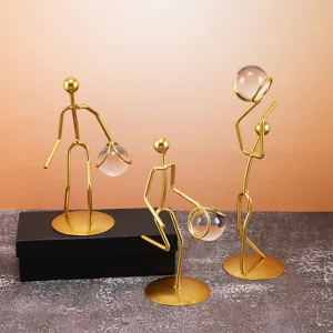 Modern golden iron art basketball figures holding crystal balls for desk decor