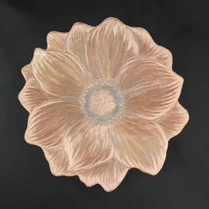 Detailed macro view showing the metallic texture of the champagne gold floral PVC placemat