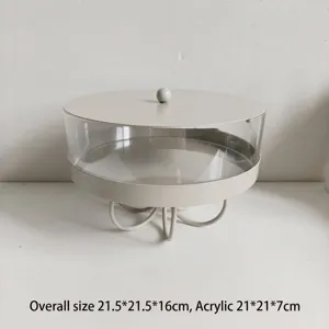 Detailed view of the iron dessert display stand with a clear acrylic bowl and lid
