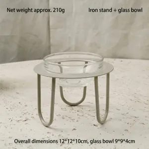 Close-up detail view of dessert stand showing iron frame and glass bowl structure