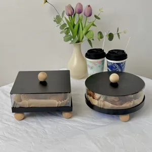 Minimalist black acrylic dessert display boxes with wooden handles in square and round shapes