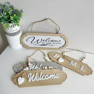 Detailed view of American vintage wooden welcome signs with heart decor and beads