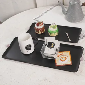 Hochwertige rechteckige mattschwarze Metalltabletts für elegante Dessert- und Kaffeeservices