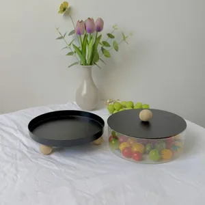 Moderno frutero redondo de acrílico minimalista con detalles en madera natural