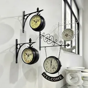 Antique European style double-sided wrought iron wall clocks with decorative brackets