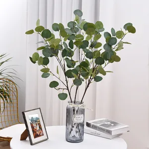 Detail view of artificial eucalyptus branches with realistic green leaves and stems