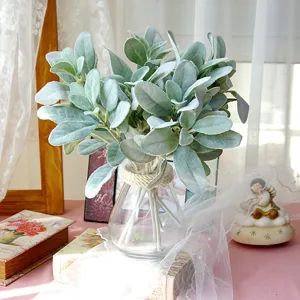 Soft flocked artificial lamb's ear leaves in a glass vase for elegant home decor