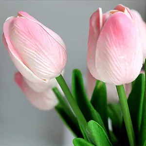 Close-up detail of pink artificial PU tulips showing realistic petal texture