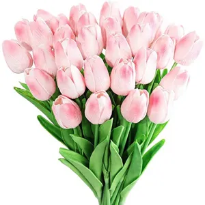 Close-up of realistic pink and white PU artificial tulips for home and wedding decor