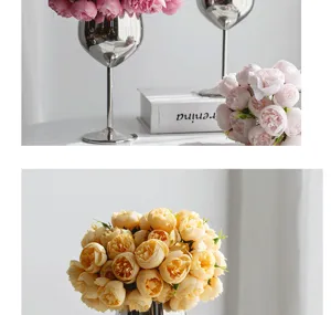 Close-up detail of champagne and pink 27-head artificial rose bouquet with silver vase