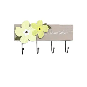 Decorative wooden wall-mounted coat rack with yellow flowers and 4 black hooks