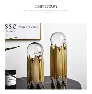 Detailed view of exquisite luxury crystal ball ornament with golden metal pillar base