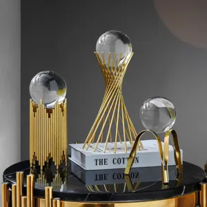 Luxury clear crystal ball ornaments with geometric gold metal stands for modern home decor