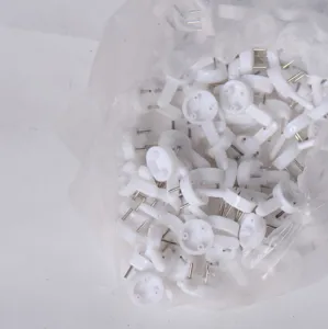 Detail shot of bulk white plastic non-marking wall hooks for photo frame mounting