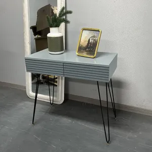 Modern blue-grey minimalist vanity table featuring dual storage drawers and black hairpin legs