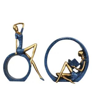 Figurines féminines abstraites élégantes en poses de yoga et lecture pour déco